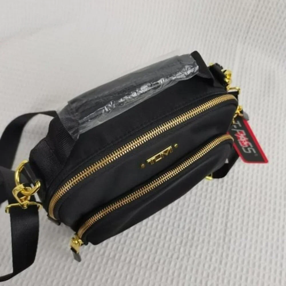 Tumi Voyageur Troy Zip Pocket Crossbody Bag in Black/Gold